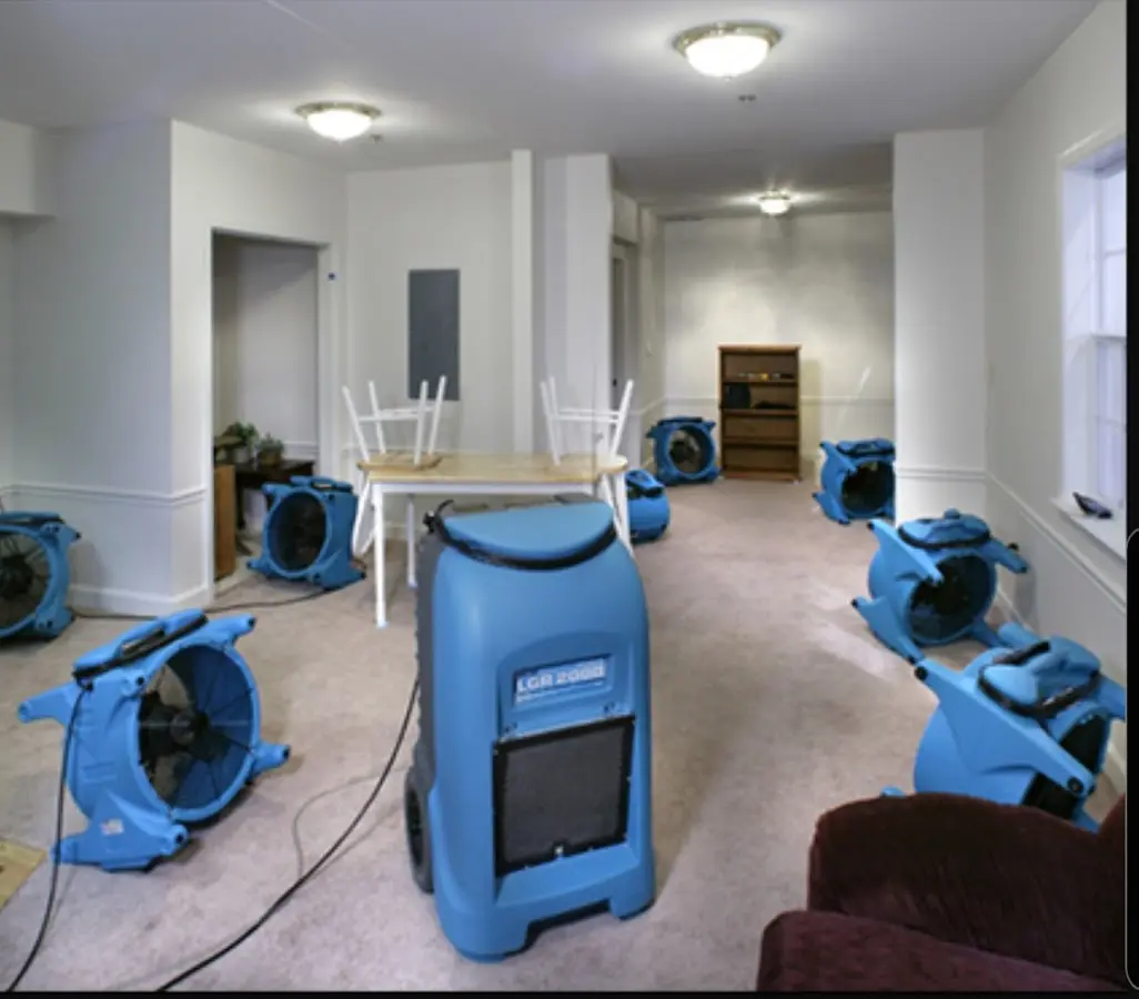 Air movers and dehumidifier setup for Water Damage Restoration in West Modesto